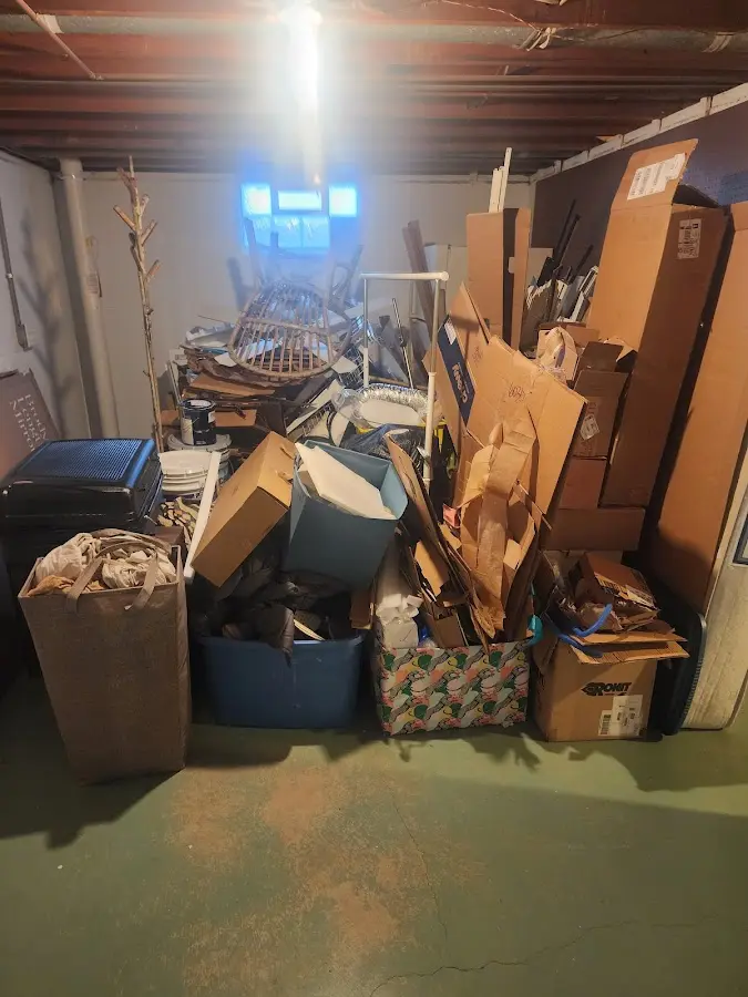 Roll-off dumpster container at job site for 2 Yard Dumpster Rental in Ivanhoe